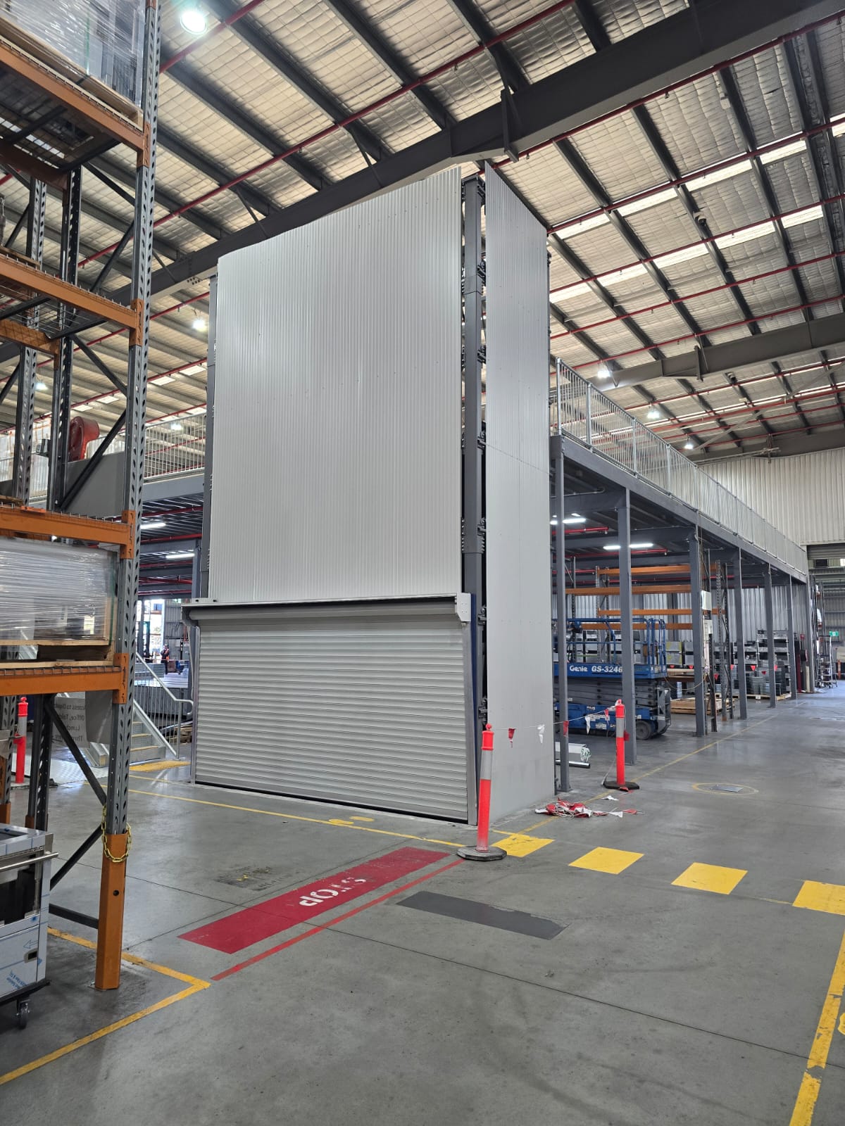 Goods lift installation serving a warehouse mezzanine in Queensland - Total Lifting Solutions