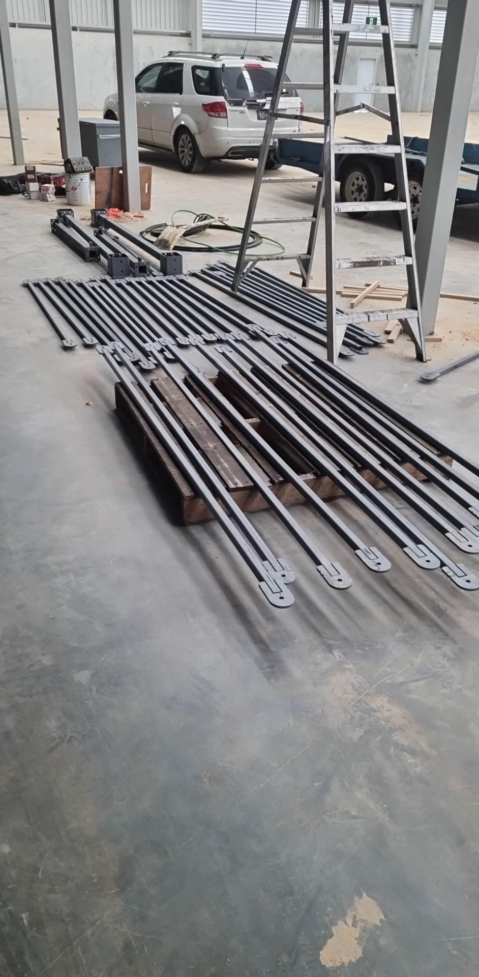 Goods lift frame components laid out ready for assembly
