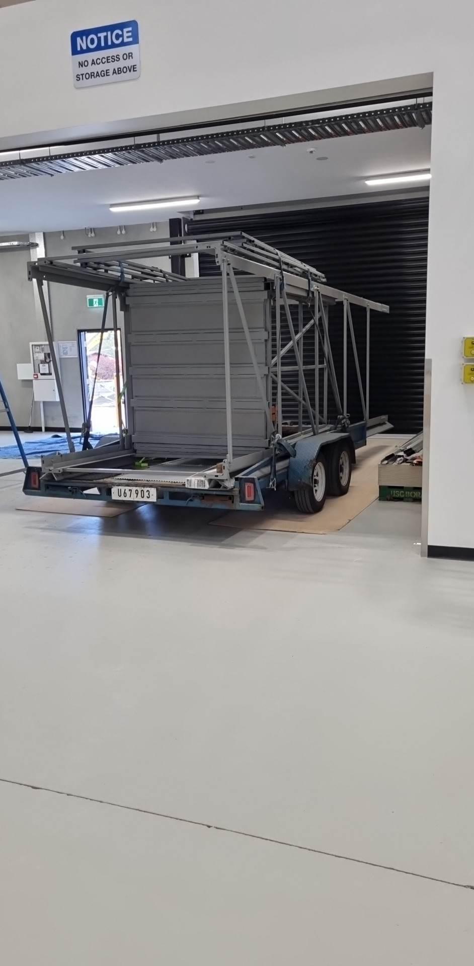 Modular goods lift sections delivered to site by trailer