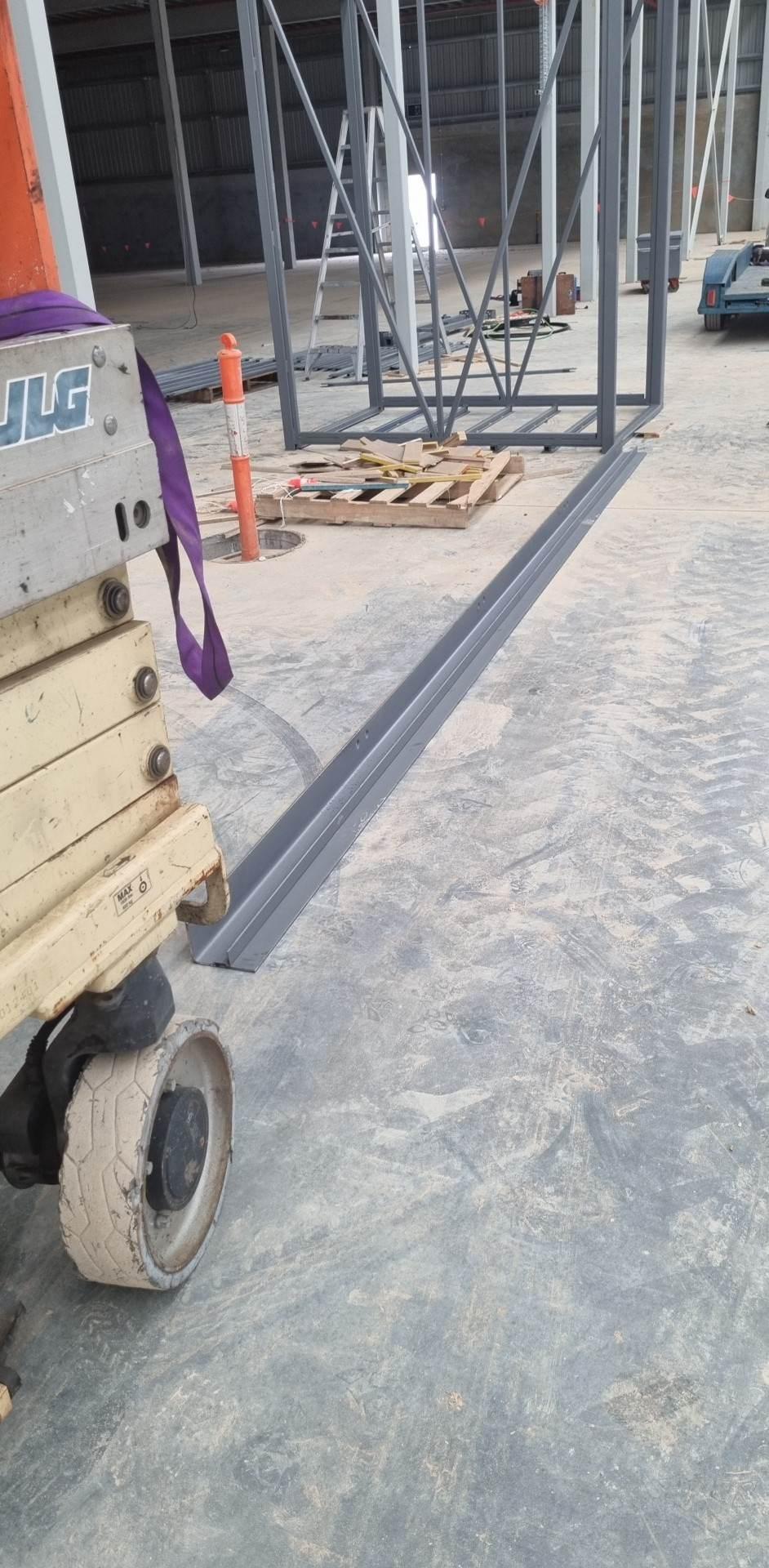 Sill and guide sections going in at floor level