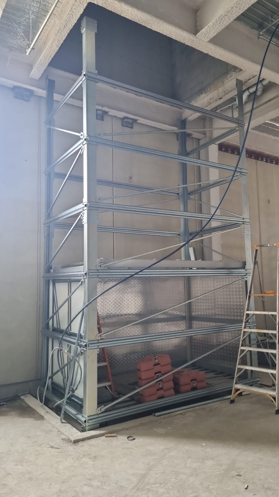 Galvanised bin hoist shaft at full height, Burnside Village Adelaide