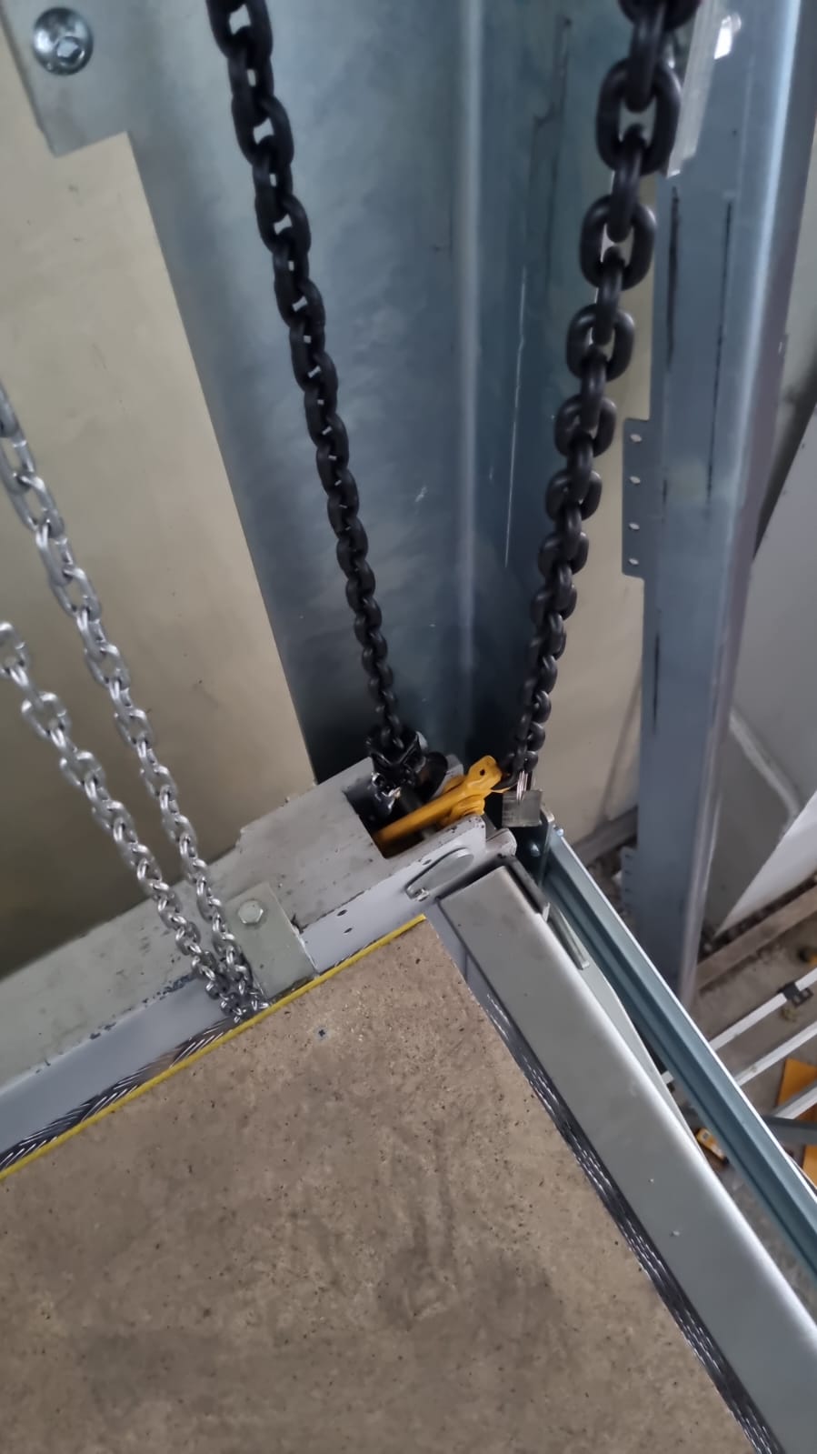 Drive chains and platform corner inside the shaft